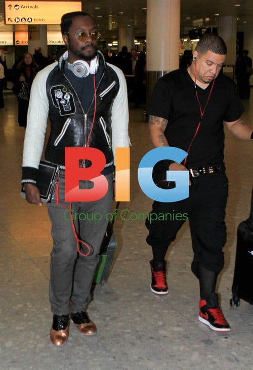 Will.i.Am Arrives at Heathrow Airport