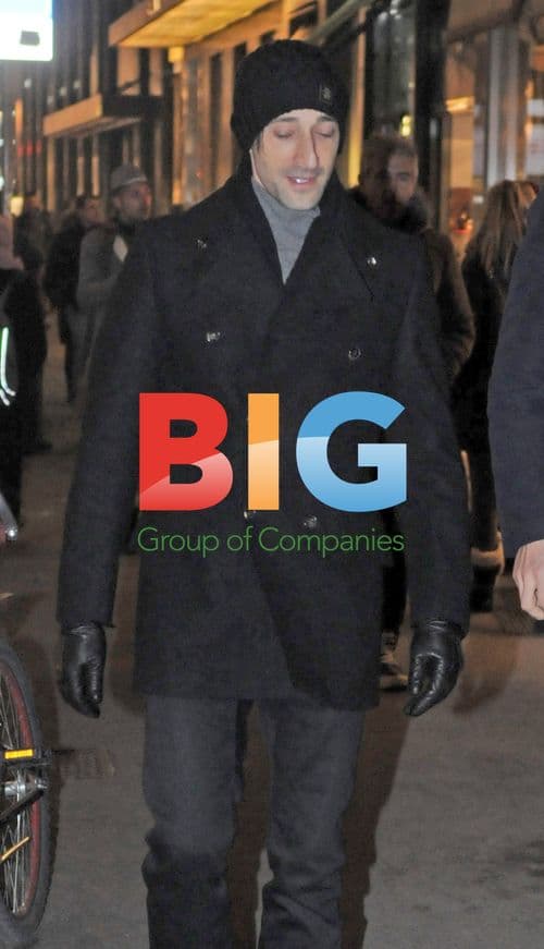 Adrian Brody goes shopping at Prada in Milan