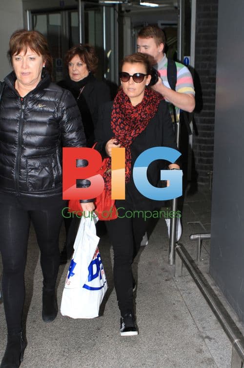 Coleen Rooney Arriving at Heathrow Airport