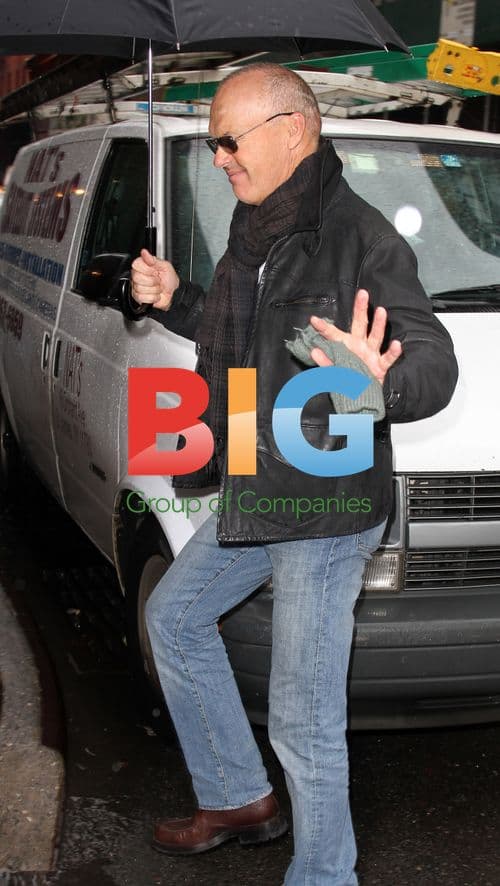 Michael Keaton Walks in Soho Rain