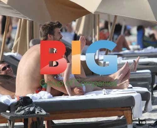 Gerard Pique Enjoys Beach with Friends in Miami