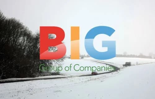 Car in snowy field in UK