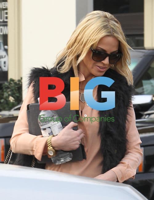 Sarah Harding takes car in for service