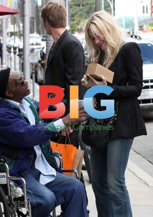 Amanda Michalka Laughs with Homeless Man