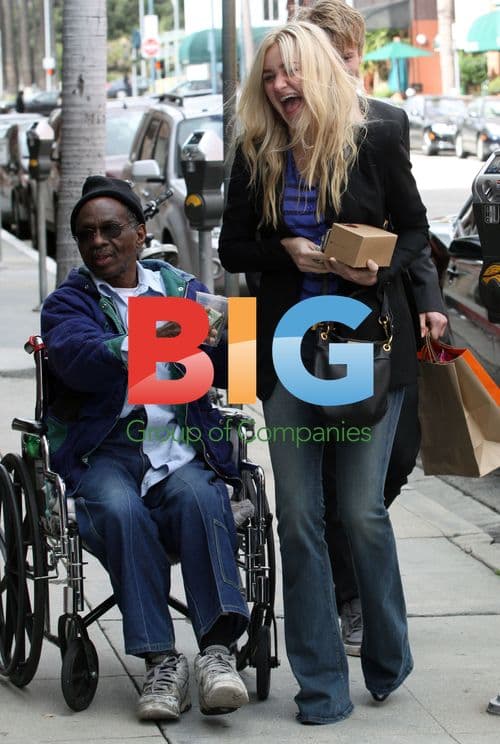 Amanda Michalka Laughs with Homeless Man