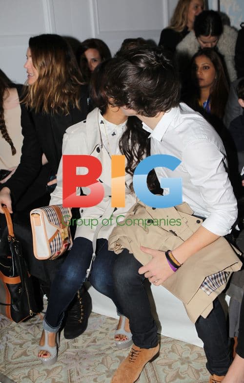 Dionne Bromfield and Harry Styles at Aquascutum LFW