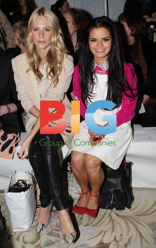 Poppy Delevigne and Bip Ling at Aquascutum LFW