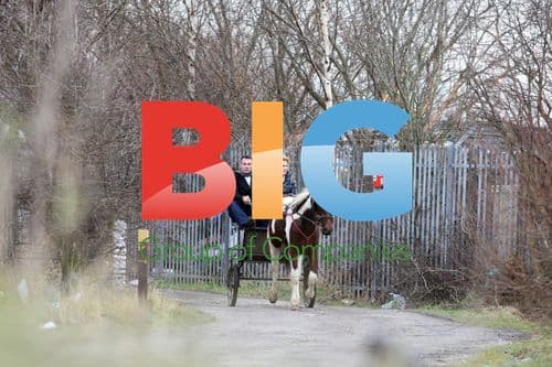 Paddy Doherty and Sally Bercow on horse and cart