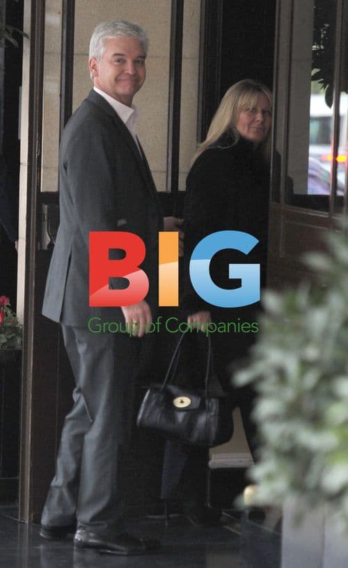 Phillip Schofield and wife arrive to Simon Cowell's tea party