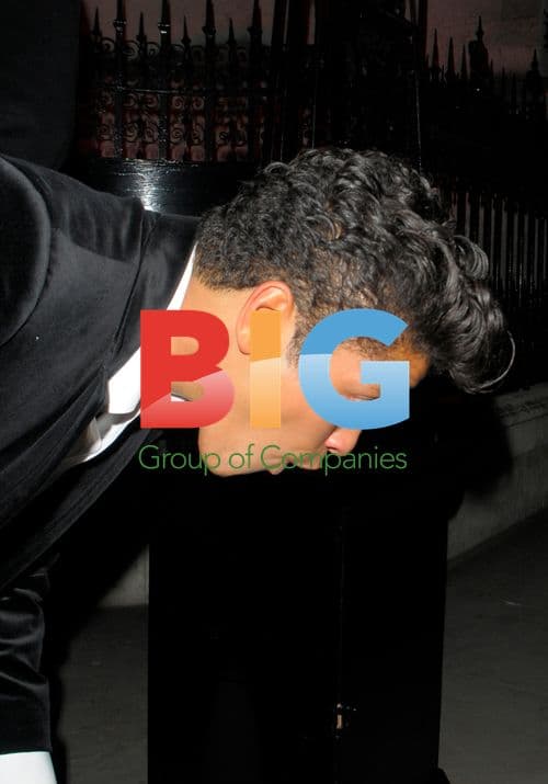 Bruno Mars Out in London After BRITs