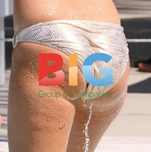 Tulisa and assistant relax poolside in Miami