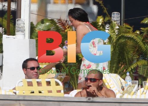Tulisa Contostavlos chills out at Miami hotel