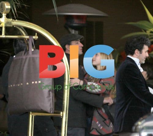 Jean Dujardin & family leaving hotel