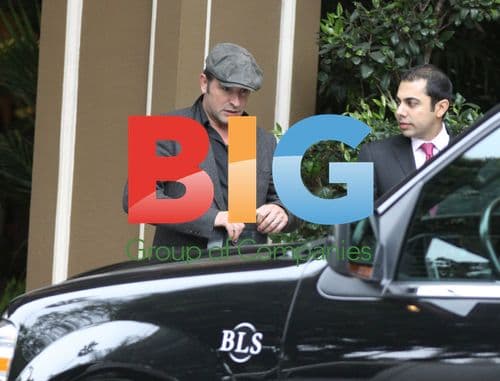 Jean Dujardin & Family Leaving Hotel