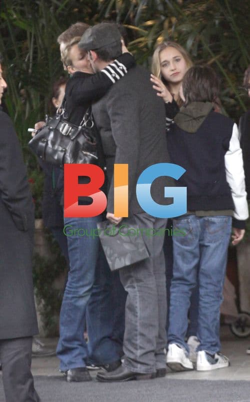 Jean Dujardin & Family Leaving Hotel