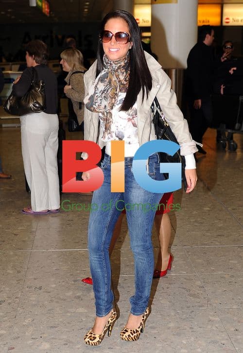 Tulisa Contostavlos Arrives at Heathrow