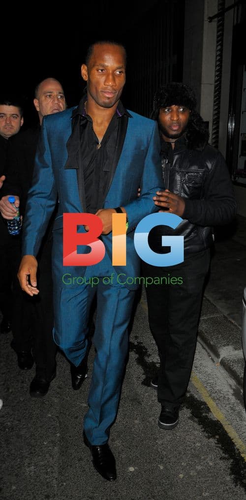 Didier Drogba with wife Alla and Malouda