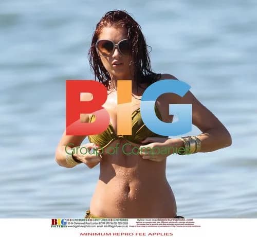 Amy Childs in Green Bikini