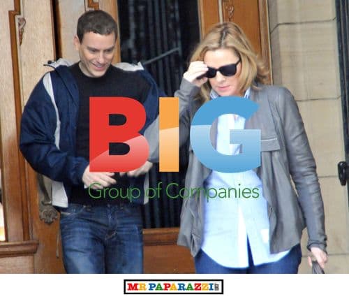 Kim Cattrall Leaves Hotel with Mystery Man