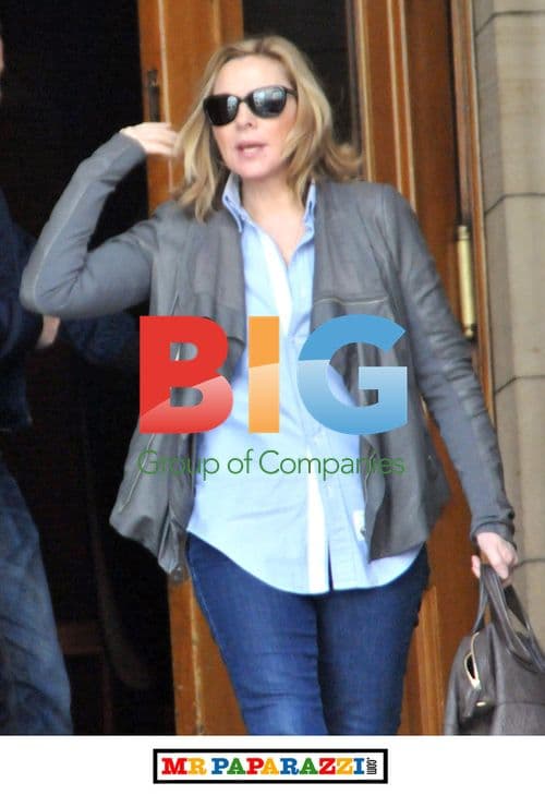 Kim Cattrall with mystery man in Glasgow