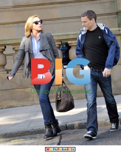 Kim Cattrall leaves hotel with mystery man in Glasgow