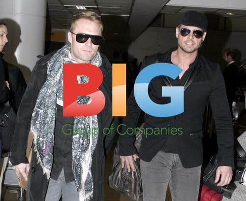 Boyzone Stars Arrive at Heathrow