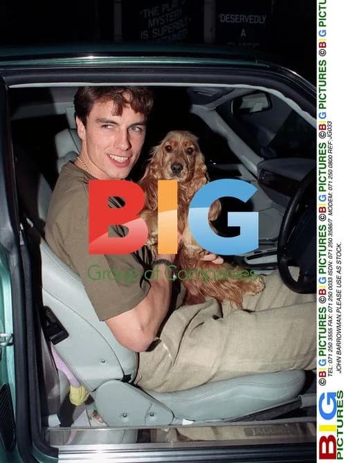 John Barrowman posing with dog