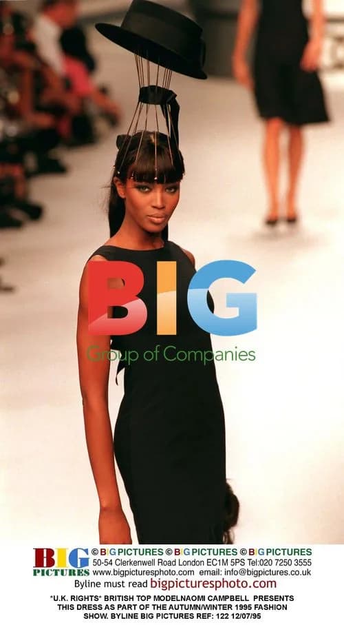 Naomi Campbell Presents Dress at Fashion Show