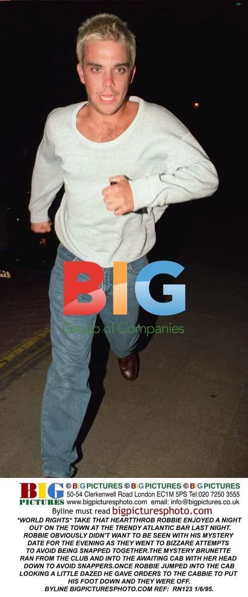 Robbie Williams Spotted on Night Out