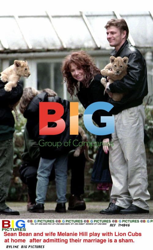 SEAN BEAN AND WIFE MELANIE HILL PLAY WITH LION CUBS