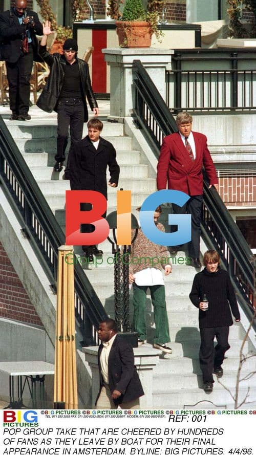 Pop group Take That departs Amsterdam by boat