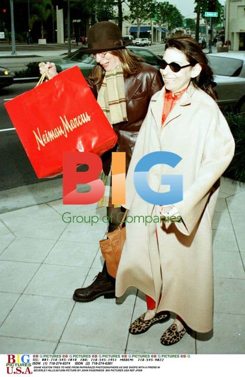 Diane Keaton hides from paparazzi in Beverly Hills
