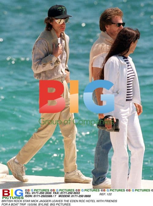 Mick Jagger leaves hotel by boat in Cannes