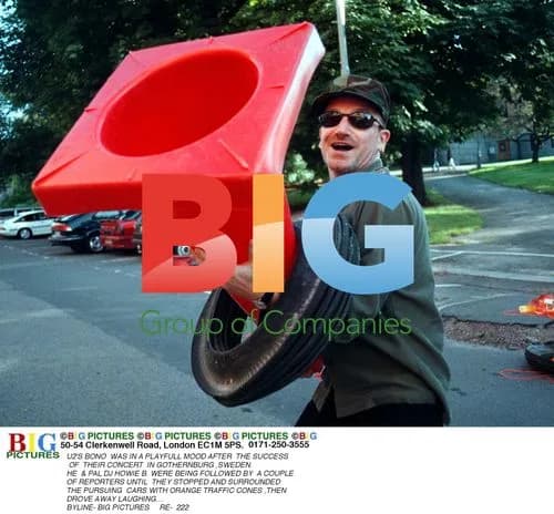 U2's Bono and DJ Howie B surrounded by cones in Gothenburg