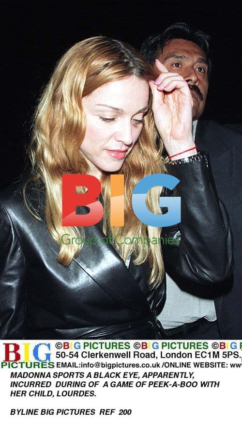 Madonna at premiere party for "2 Girls & a Guy"