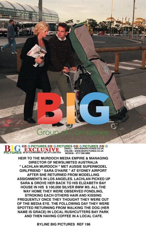 Lachlan Murdoch and Sara O'Hare at Sydney Airport