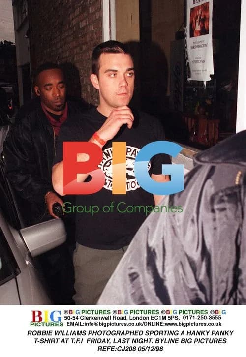 Robbie Williams at T.F.I Friday