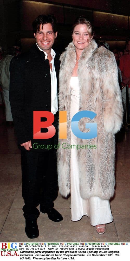Hank Cheyne and wife at Spelling's Christmas party