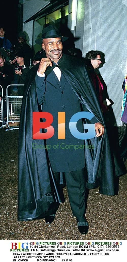 Evander Holyfield Arrives in Fancy Dress