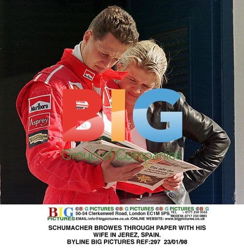 Schumacher Browses Papers with Wife in Jerez
