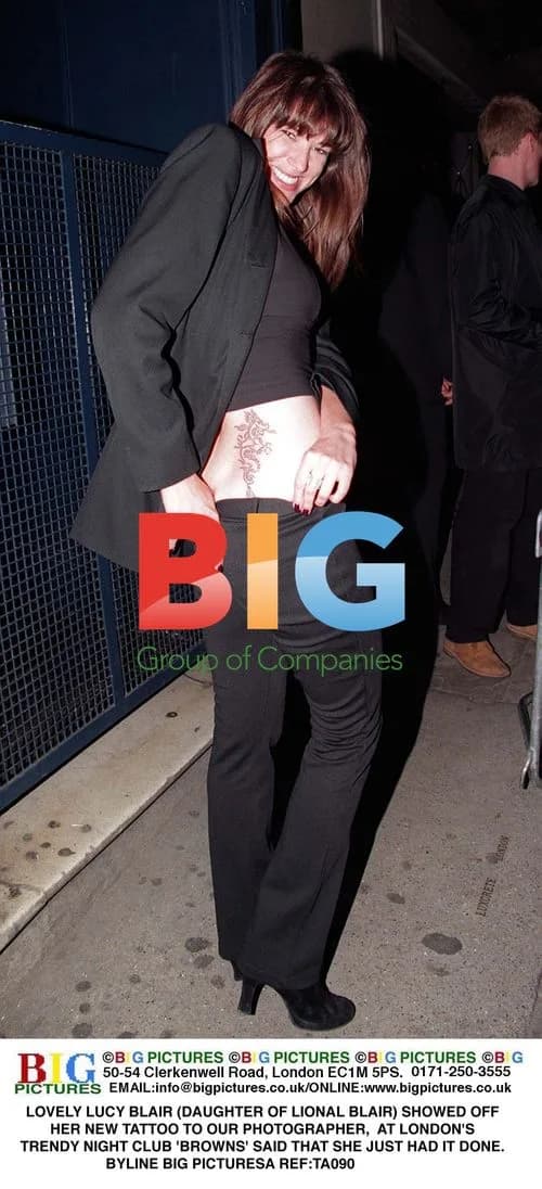 Lucy Blair Shows Off Tattoo at London Club