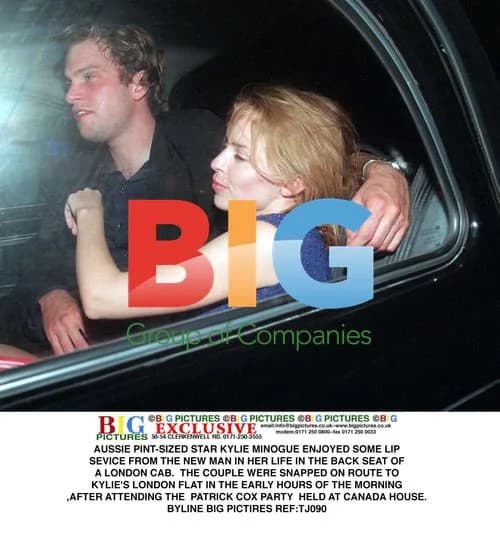 Kylie Minogue Enjoys PDA with Mystery Man