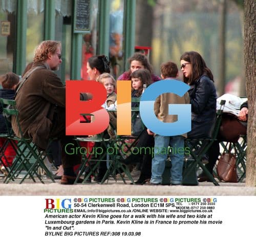 Kevin Kline with family in Paris