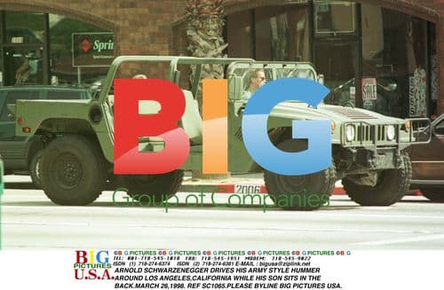 Arnold Schwarzenegger drives Hummer with son