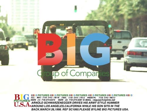 ARNOLD SCHWARZENEGGER DRIVES HIS ARMY STYLE HUMMER