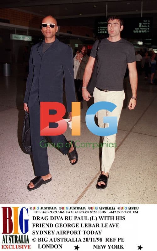 Ru Paul and boyfriend George Lebar at Sydney airport