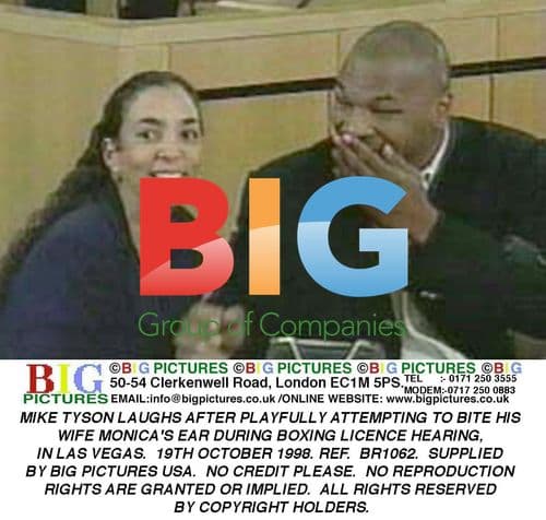 Mike Tyson tries to bite wife's ear