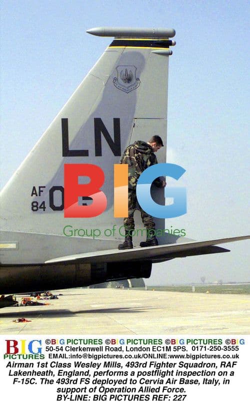 Airman performs post-flight inspection on F-15C