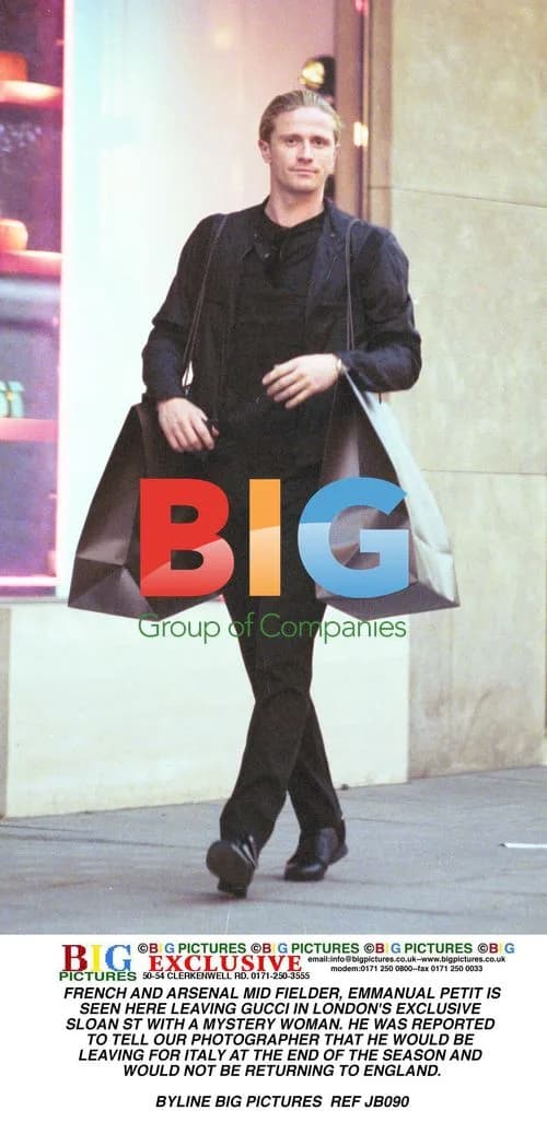 Emmanuel Petit Spotted Leaving Gucci