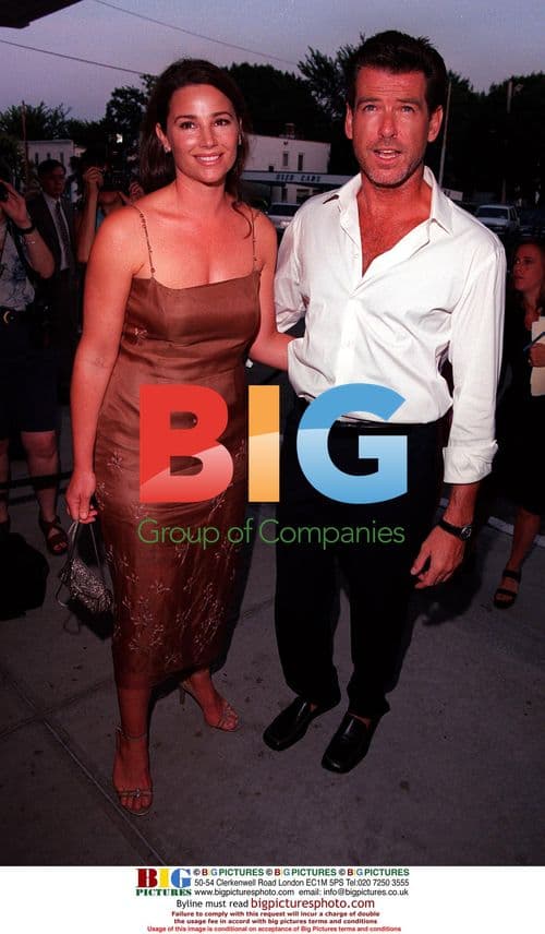 Pierce Brosnan and wife at "The Thomas Crown Affair" premiere